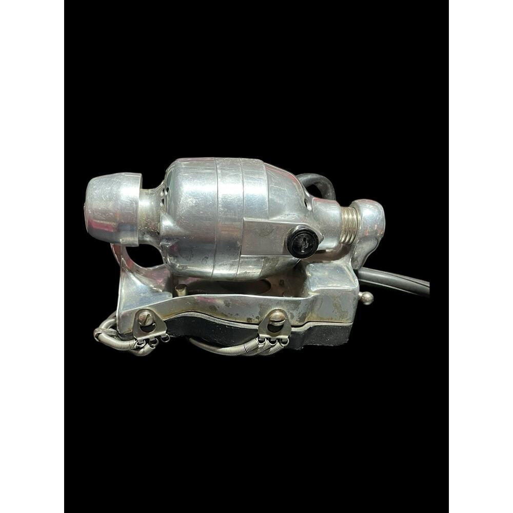 Oster Stim-U-Lax massager, a vintage-style, heavy-duty hand massager
